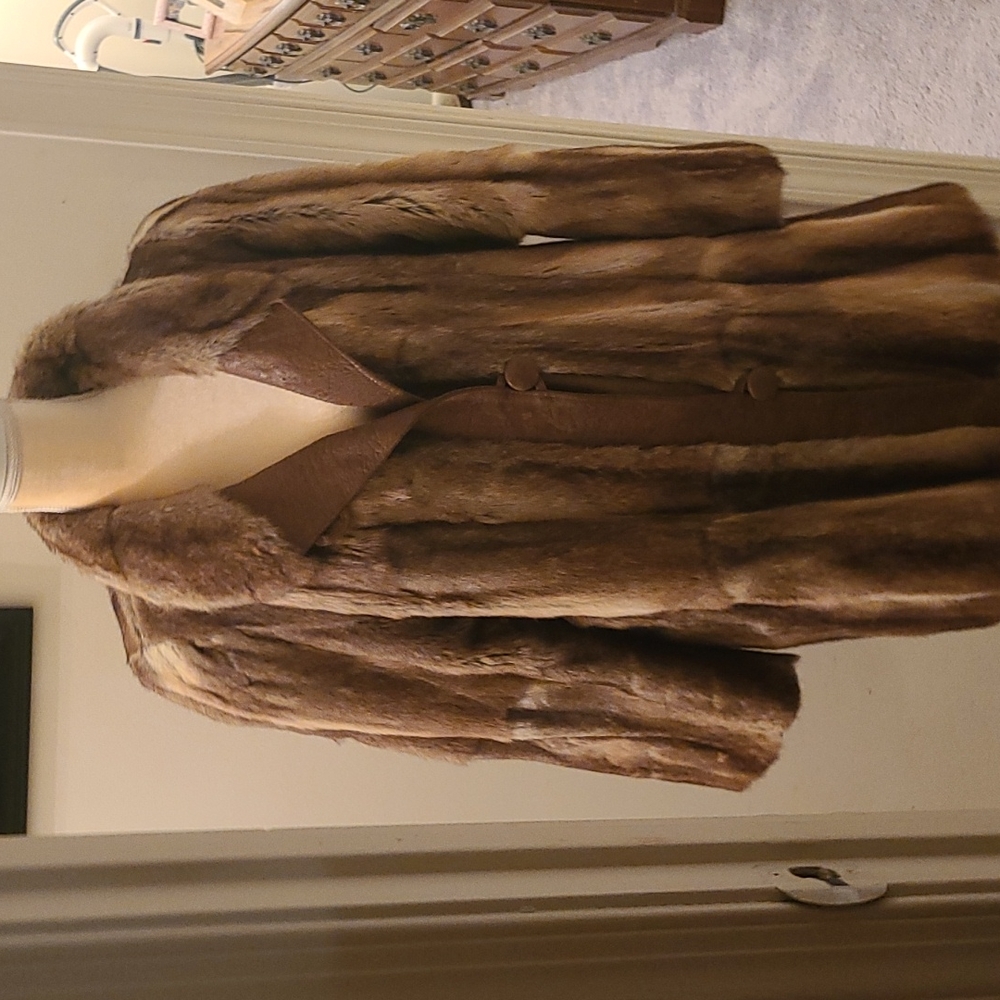 Fur coat leather trim